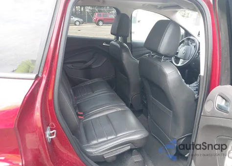 2017 Ford Escape Titanium z USA, uszkodzony, nr VIN 1FMCU0JD2HUD91350